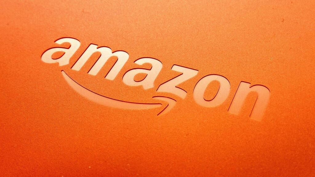 Amazon logo debossed on smooth orange background modern stylish wallpaper for device display
