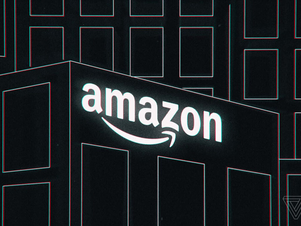 Amazon UK logo glowing over dark cityscape with minimalist geometric buildings digital wallpaper