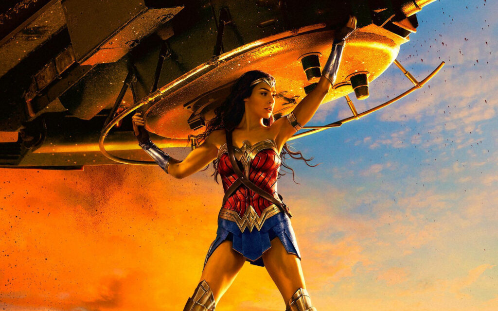 Superpowered Wonder Woman effortlessly hoists a massive tank, awing all with her incredible might. Wallpaper