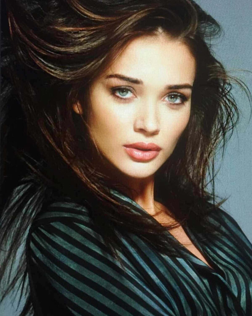 Amy Jackson in stylish summer outfit radiating elegance and charm confident pose wallpaper