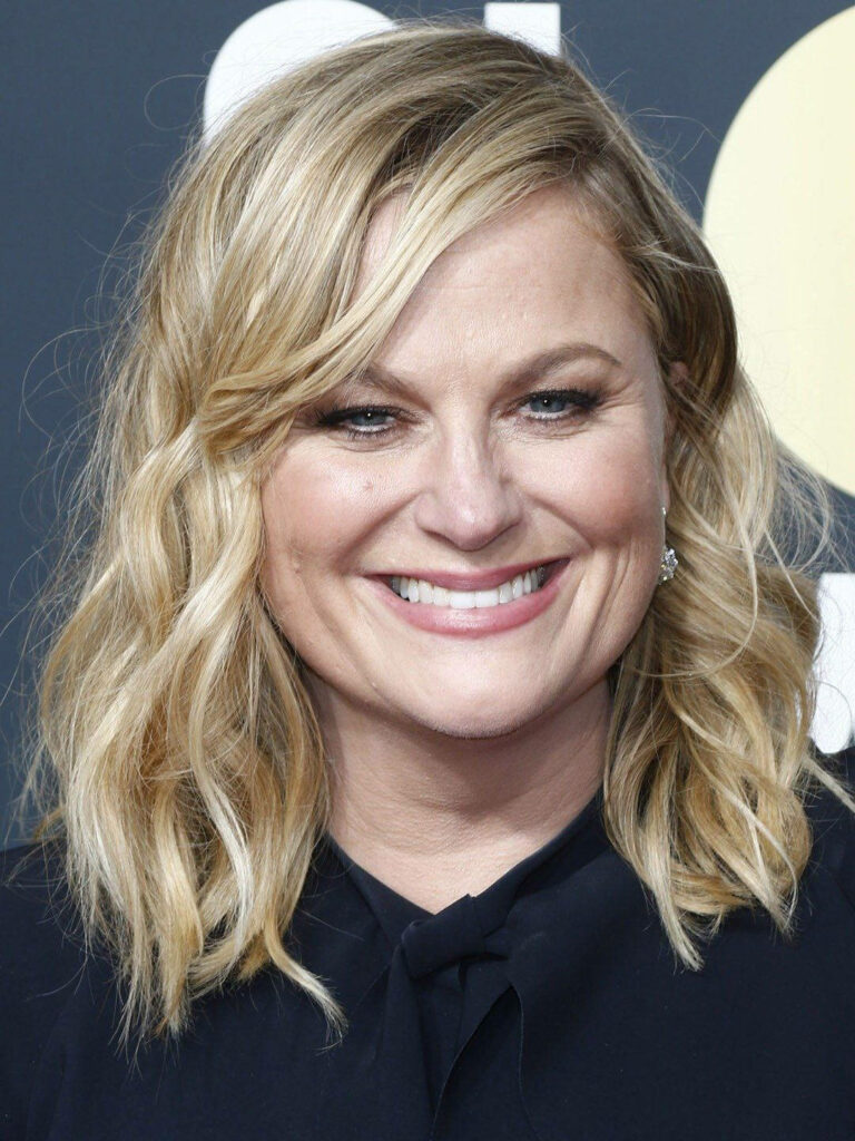 Amy Poehler smiling brightly in high resolution Saturday Night Live wallpaper background