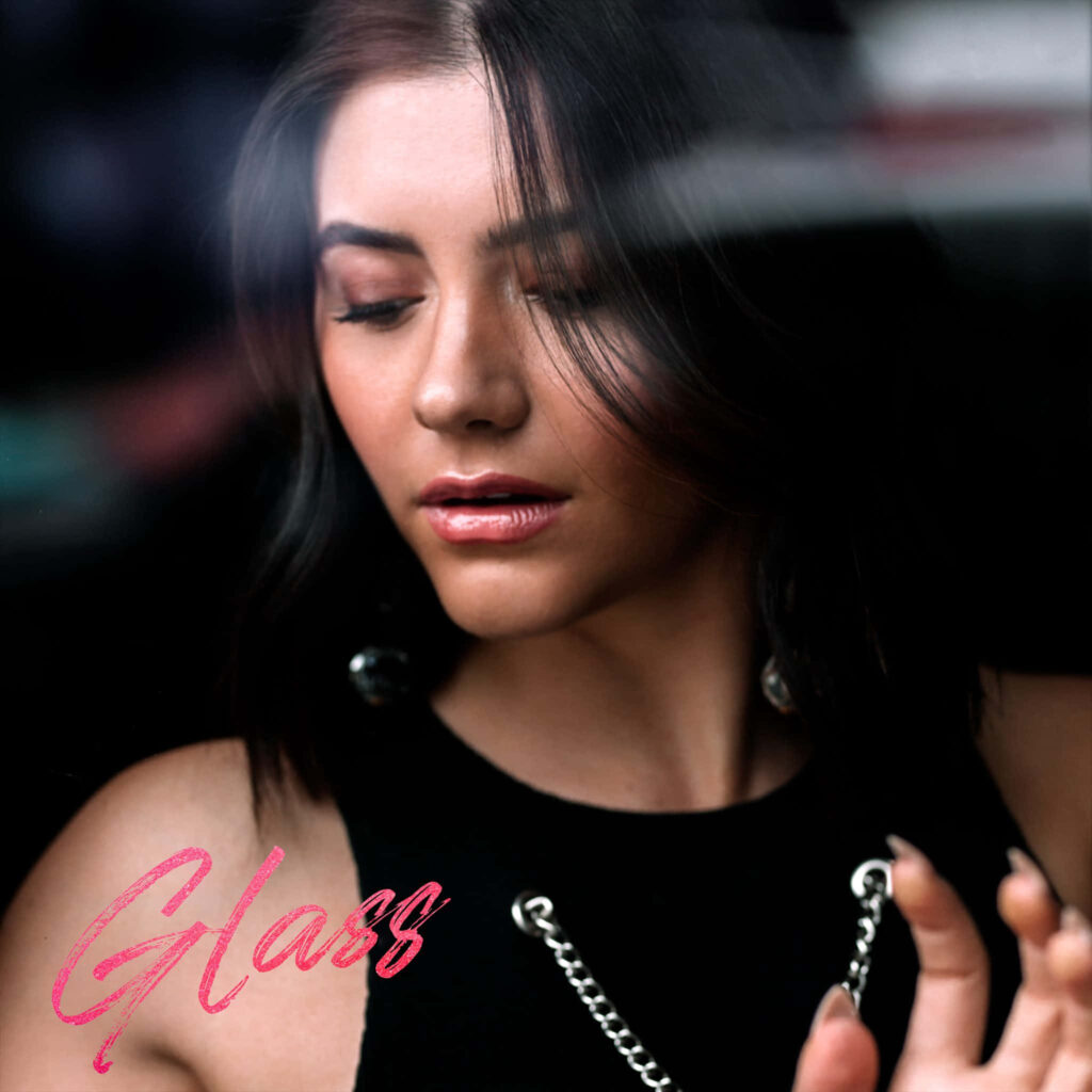 Ana Golja calm reflective gaze through glass window serene contemplative wallpaper background