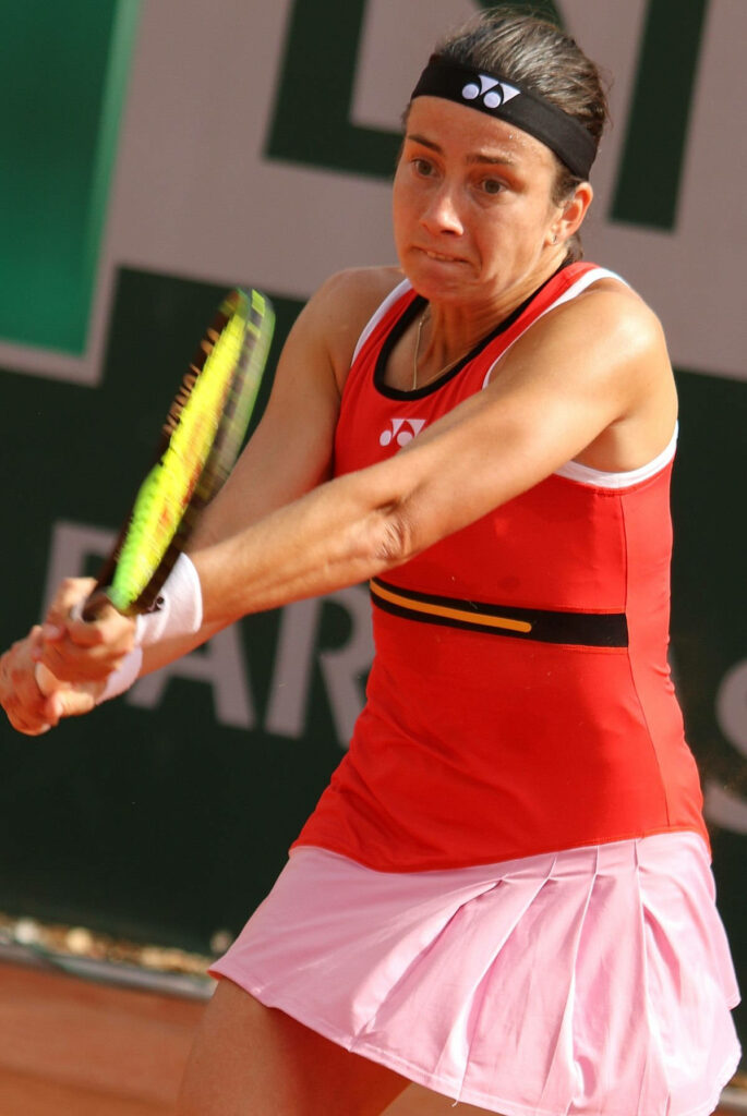 Anastasija Sevastova intense tennis focus dynamic stance athleticism on court wallpaper background