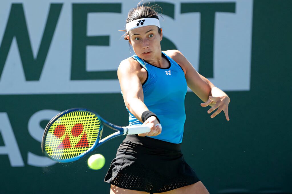 Anastasija Sevastova focused returning tennis shot showcasing athleticism determination wallpaper