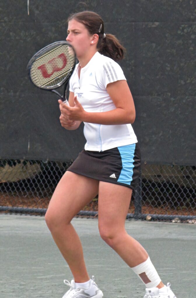Anastasija Sevastova playing tennis with Wilson racket in Adidas sportswear on court wallpaper
