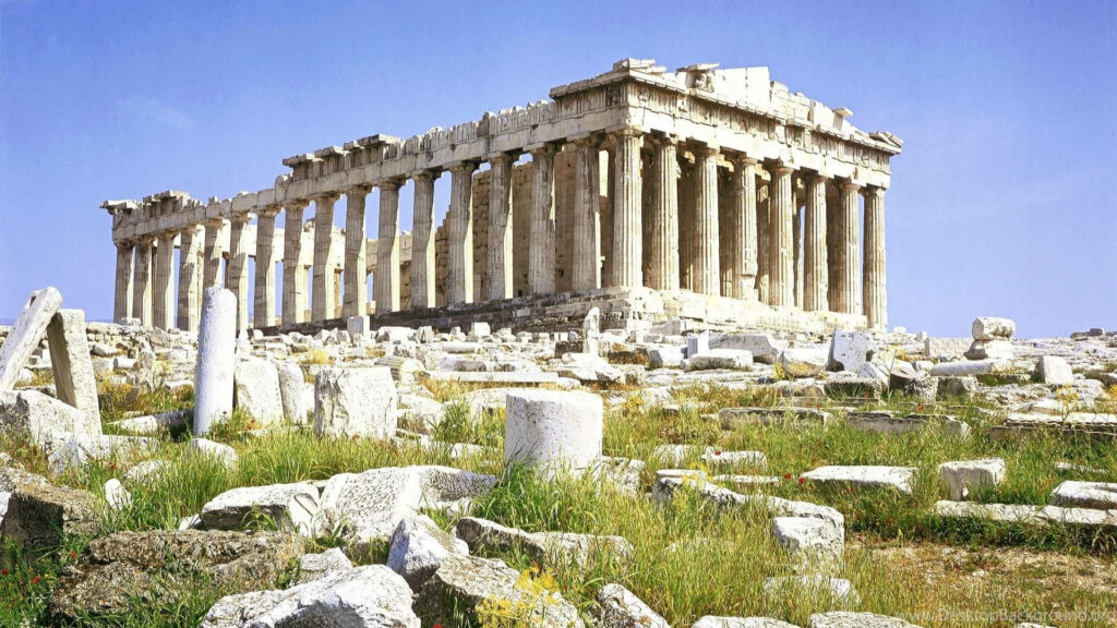 Ancient Parthenon ruins in Athens with majestic columns under bright blue sky wallpaper background