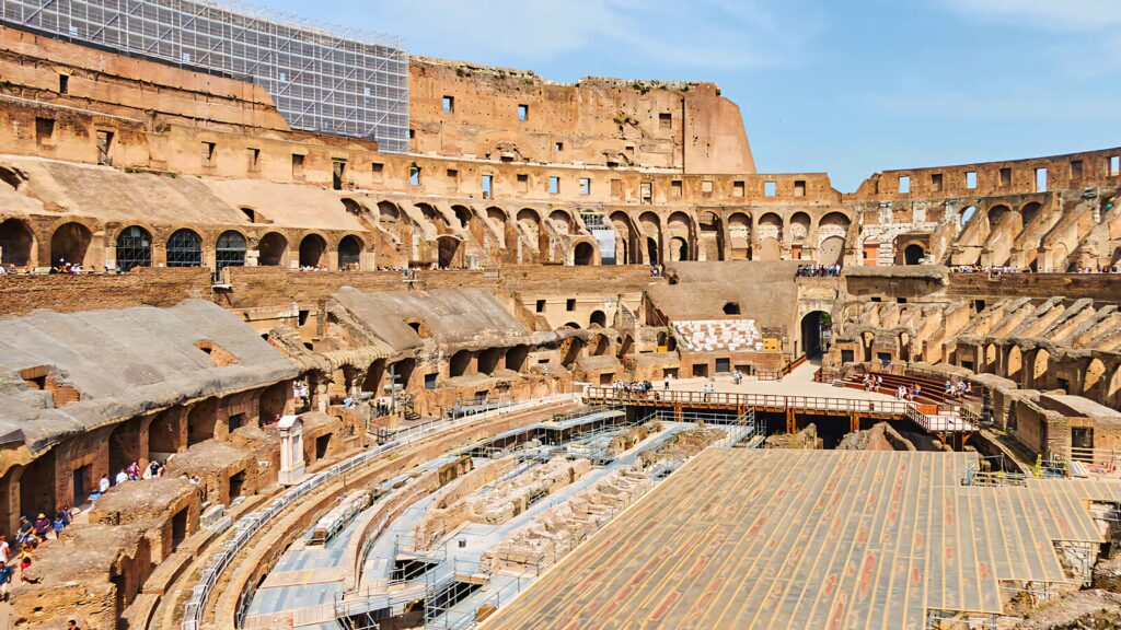 Ancient Roman Colosseum wallpaper daylight historic stone arches detailed arena background
