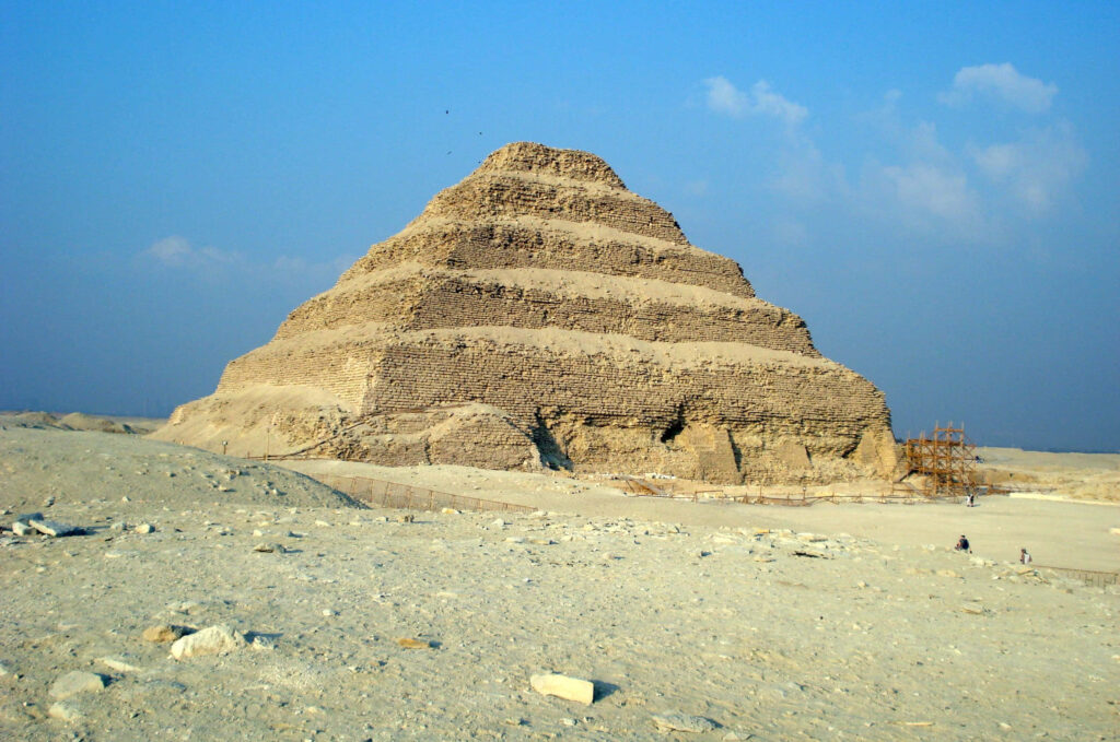 Saqqara Pyramid Egypt ancient stepped structure desert landscape clear blue sky wallpaper