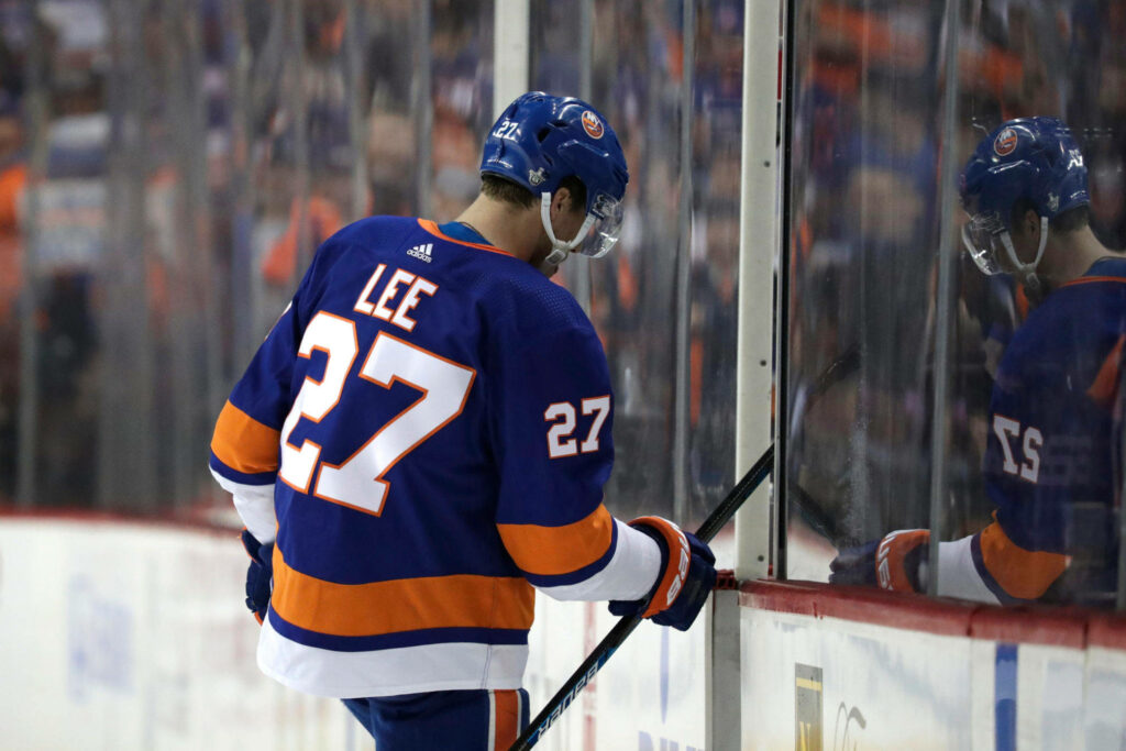 Anders Lee New York Islanders NHL player in penalty box during intense hockey game wallpaper