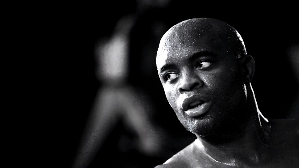 Anderson Silva intense interview monochrome wallpaper showing legendary MMA fighter focus