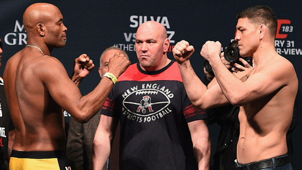 Anderson Silva intense pre-match face off with opponent on stage wallpaper background