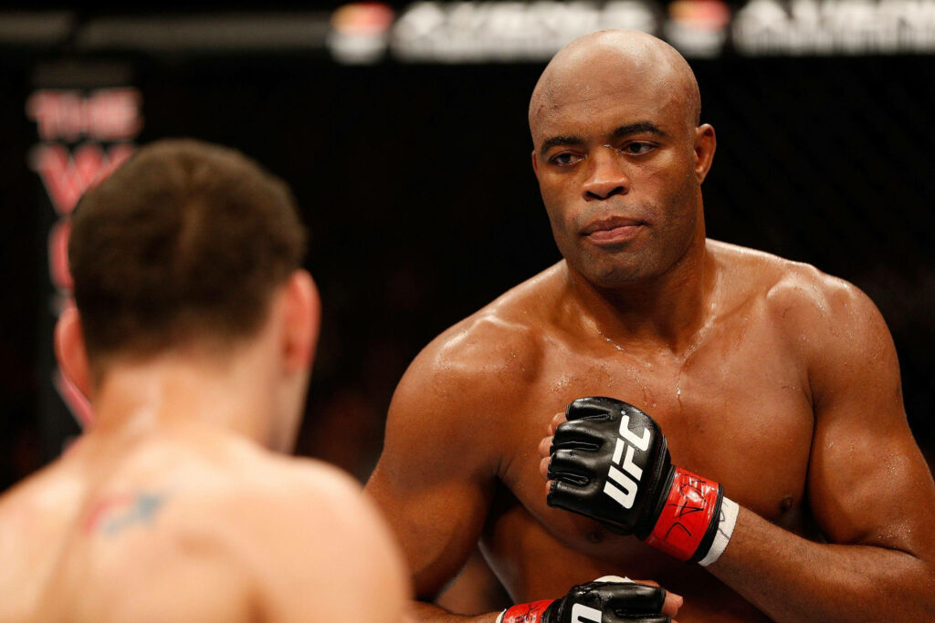 Anderson Silva focused and ready to strike his opponent inside the UFC octagon wallpaper