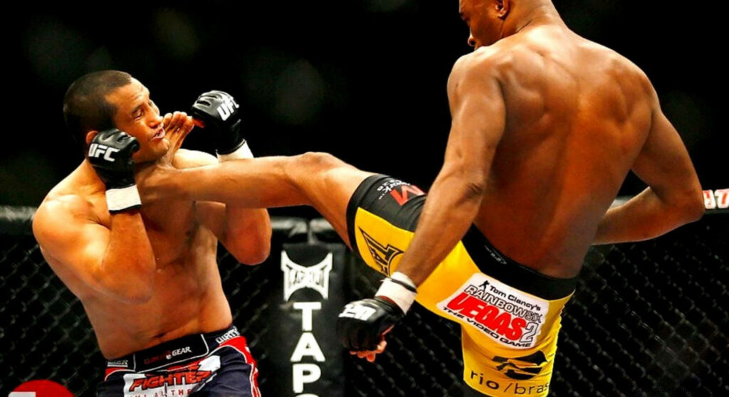 Anderson Silva powerful UFC kick to opponent's face dynamic wallpaper showcasing fight intensity