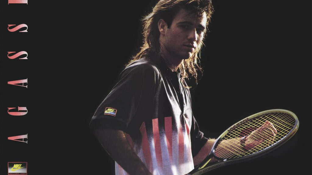 Intense Andre Agassi Tennis Wallpaper: Focused Pose & Dark Backdrop