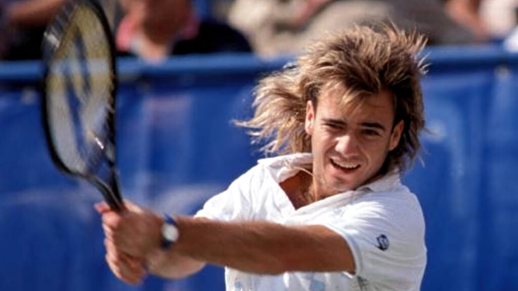 Andre Agassi in Action: Iconic Mullet Tennis Wallpaper Background