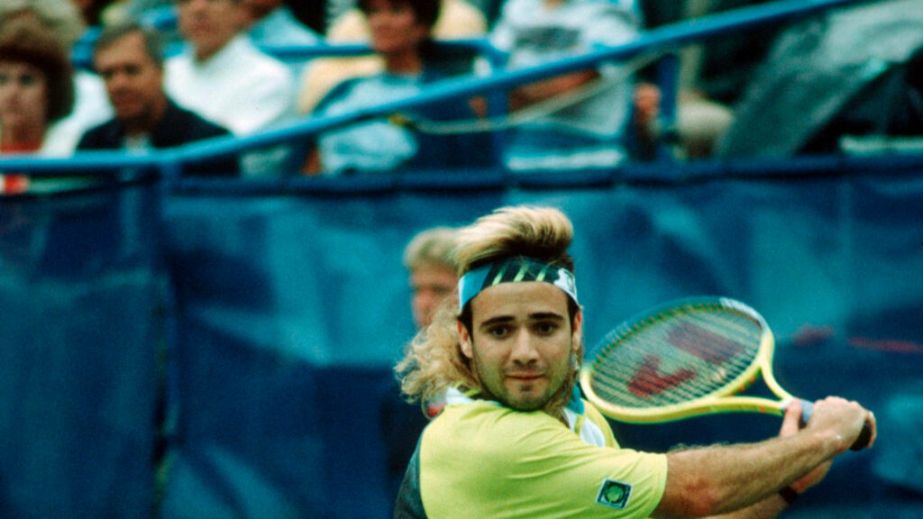 Andre Agassi Tennis Match Wallpaper: Intense Expression & Iconic Style