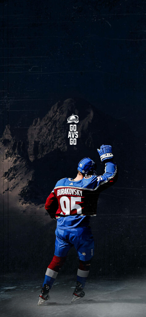 Andre Burakovsky in Colorado Avalanche jersey with snowy mountain and Go Avs Go background Wallpaper