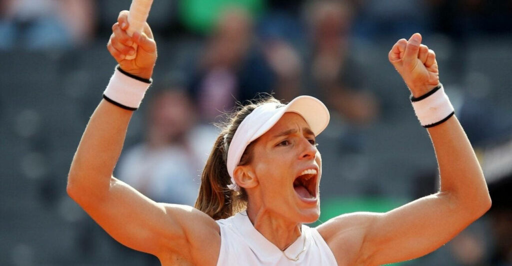 Andrea Petkovic intense celebration on Wimbledon 2022 tennis court dynamic sports wallpaper