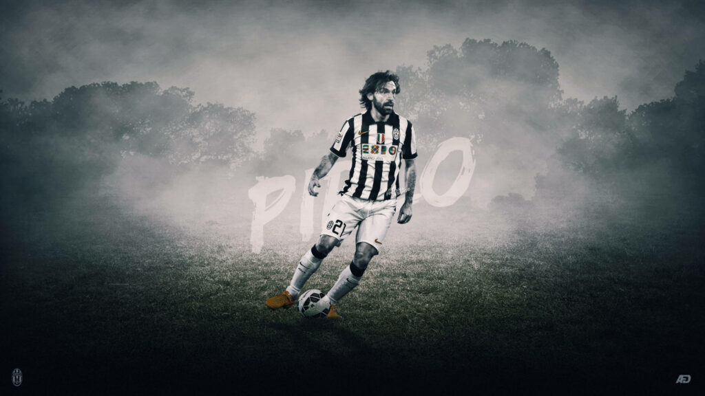 Andrea Pirlo in Juventus kit mid-action on field with misty dramatic background wallpaper