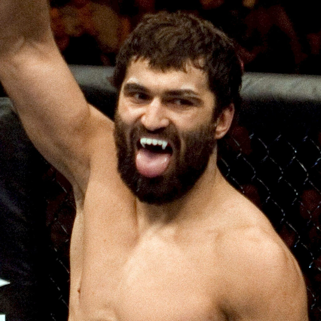 Andrei Arlovski celebrates victorious in octagon with fierce expression former heavyweight champ Wallpaper