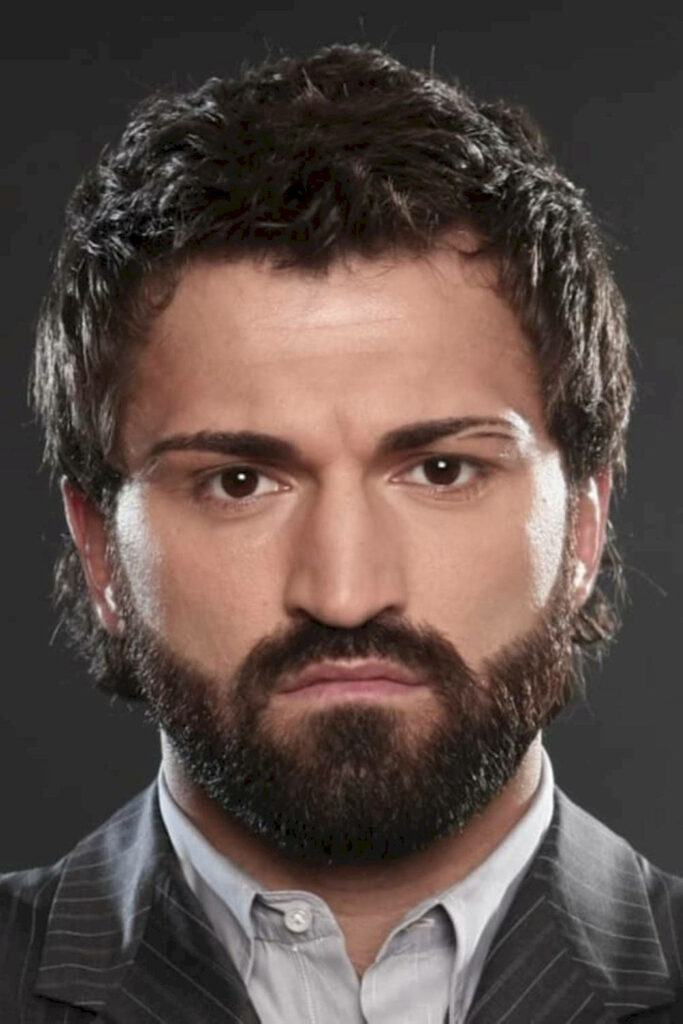 Andrei Arlovski Belarusian American martial artist in sharp suit intense confident wallpaper background