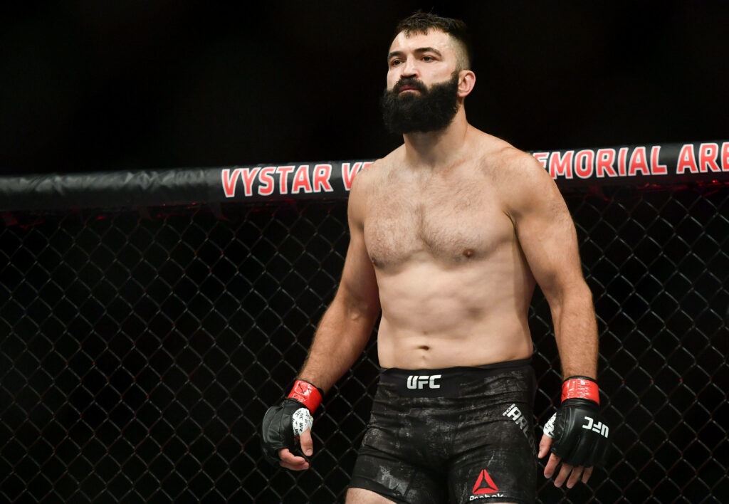 Andrei Arlovski UFC fighter in octagon displaying muscular physique and intense focus wallpaper