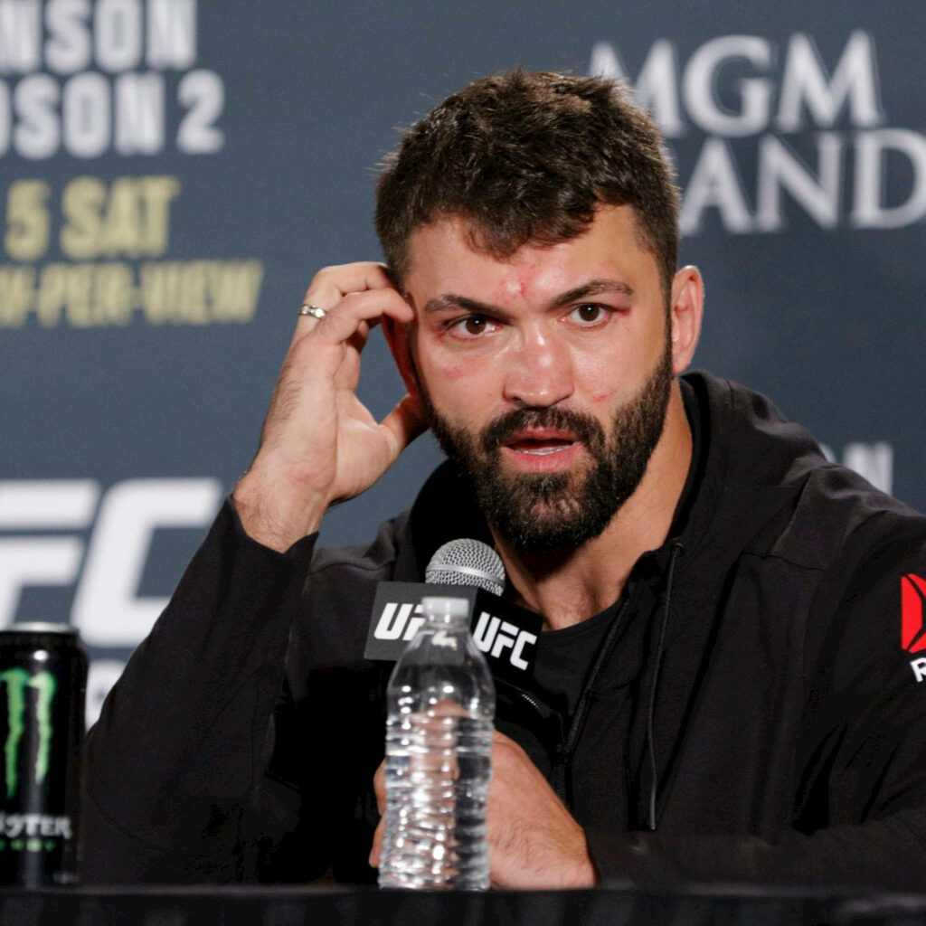 Andrei Arlovski UFC press conference showing fight signs heavyweight division wins record Wallpaper