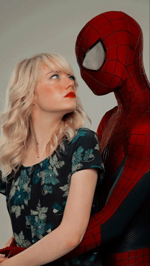 Andrew Garfield as Spider-Man and Emma Stone share an emotional moment HD wallpaper background