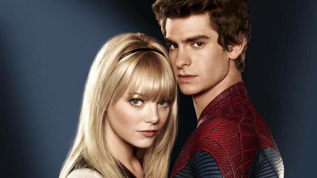 Andrew Garfield as Spider-Man embraces Gwen Stacy in a romantic intense wallpaper background