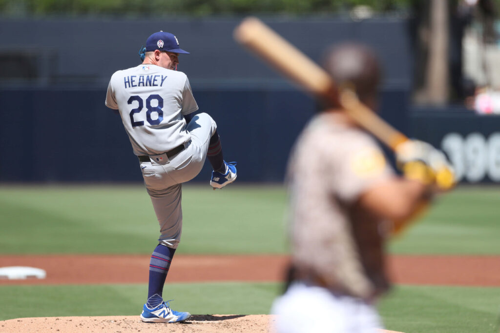 Andrew Heaney pitching intensely on the mound during a professional baseball game wallpaper background