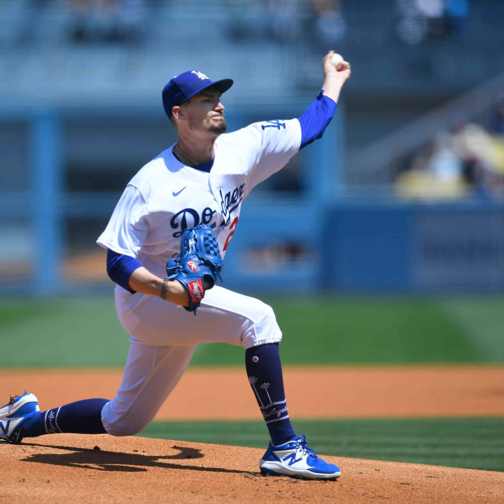 Andrew Heaney pitching with intense focus in full Dodgers uniform during baseball game wallpaper