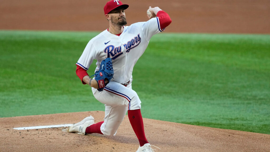 Andrew Heaney Texas Rangers pitching on mound focused professional baseball action wallpaper
