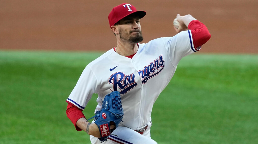 Andrew Heaney pitching for Texas Rangers showing intense focus and signature motion wallpaper