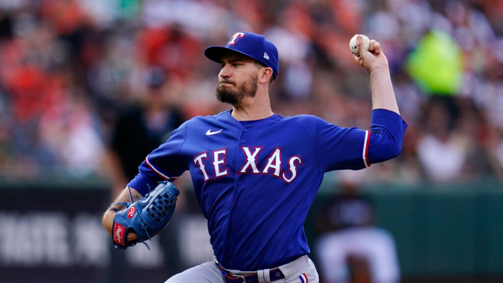 Andrew Heaney pitching in Texas Rangers uniform mid-motion during baseball game wallpaper