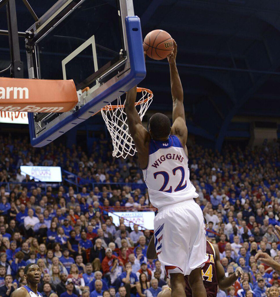 Andrew Wiggins slam dunk basketball game intense action high energy sports wallpaper background