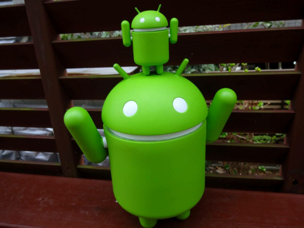 Unveiling the Adorable Collection: The Green Android Developer Toys in Multiple Sizes, Perfectly Complementing the Android Developer Background Wallpaper