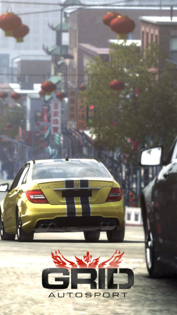 Speedy Golden Racecar on Urban Circuit: Grid Autosport Wallpaper