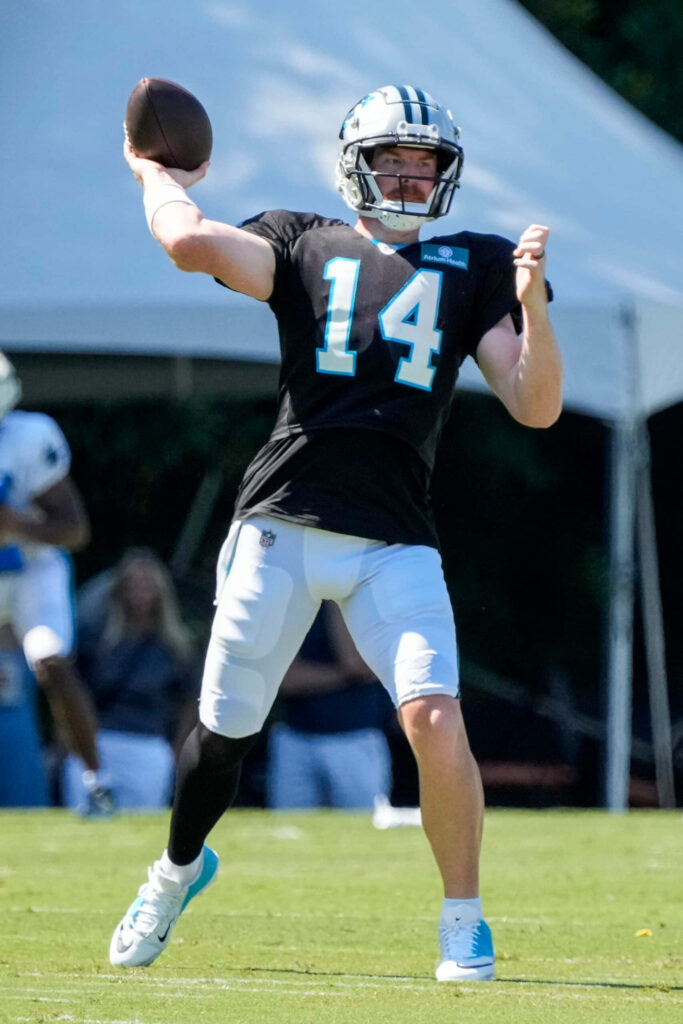 Andy Dalton number 14 quarterback training throwing football on practice field wallpaper background