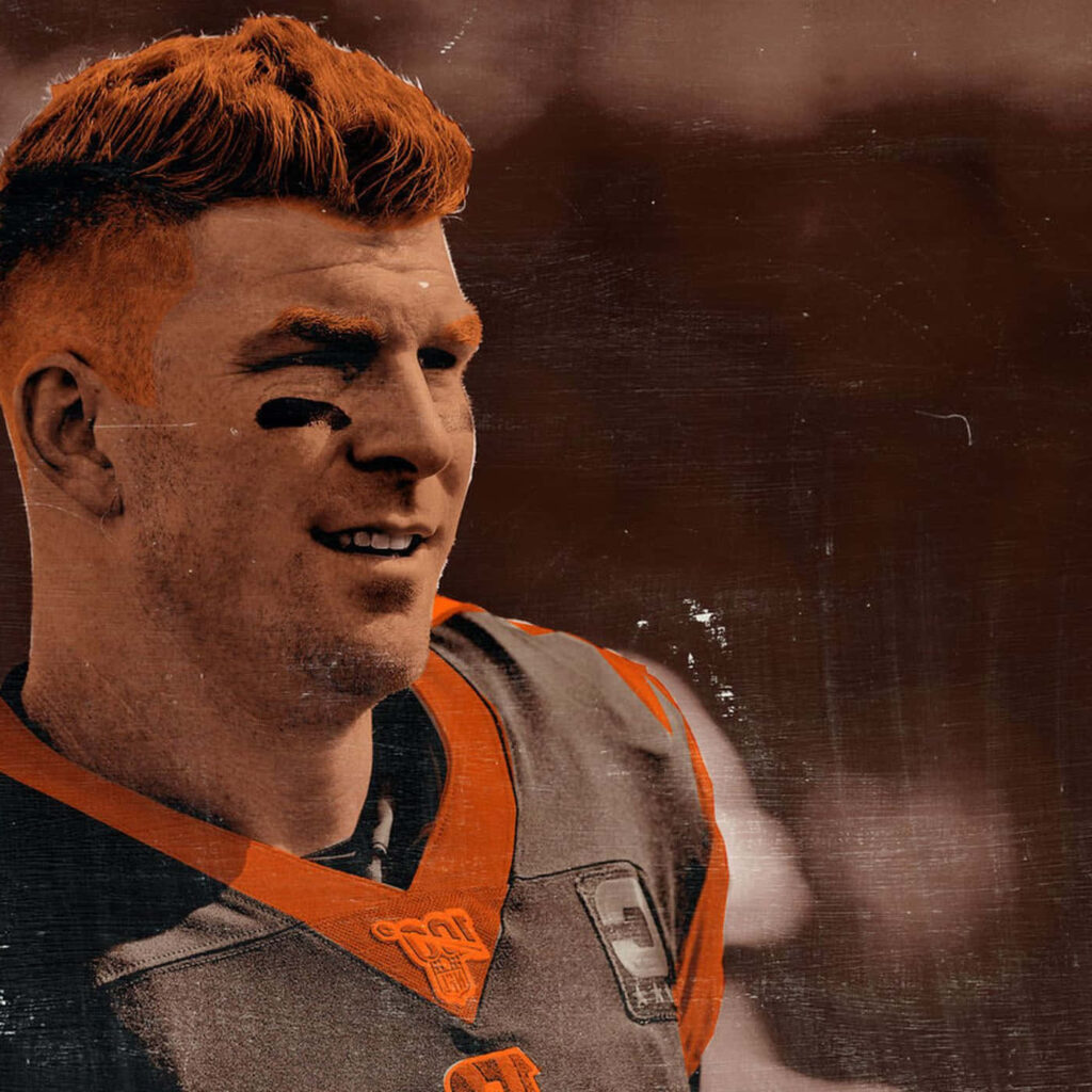 Andy Dalton side profile in football uniform showing focused expression and red hair wallpaper