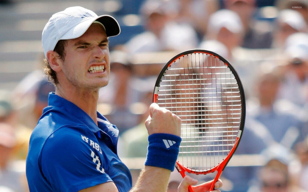 Andy Murray clenches fist showing intense determination in dynamic tennis match wallpaper