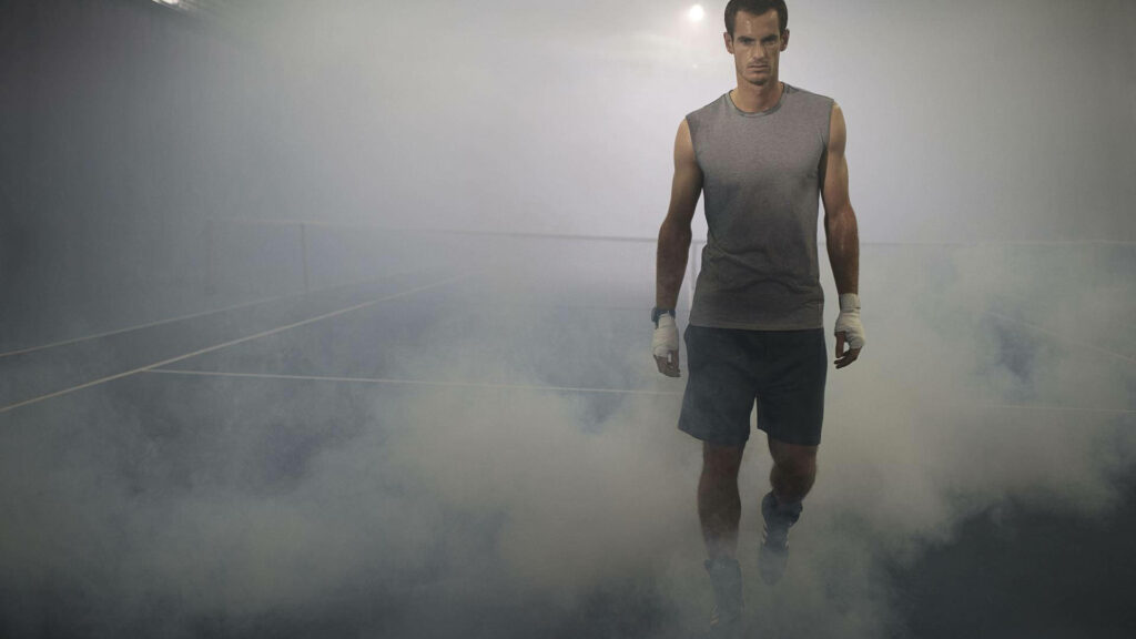 Andy Murray on tennis court with swirling smoke intense dramatic wallpaper background