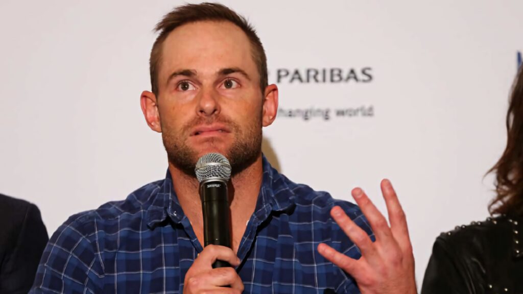 Andy Roddick tennis player speaking at press event professional sports wallpaper background