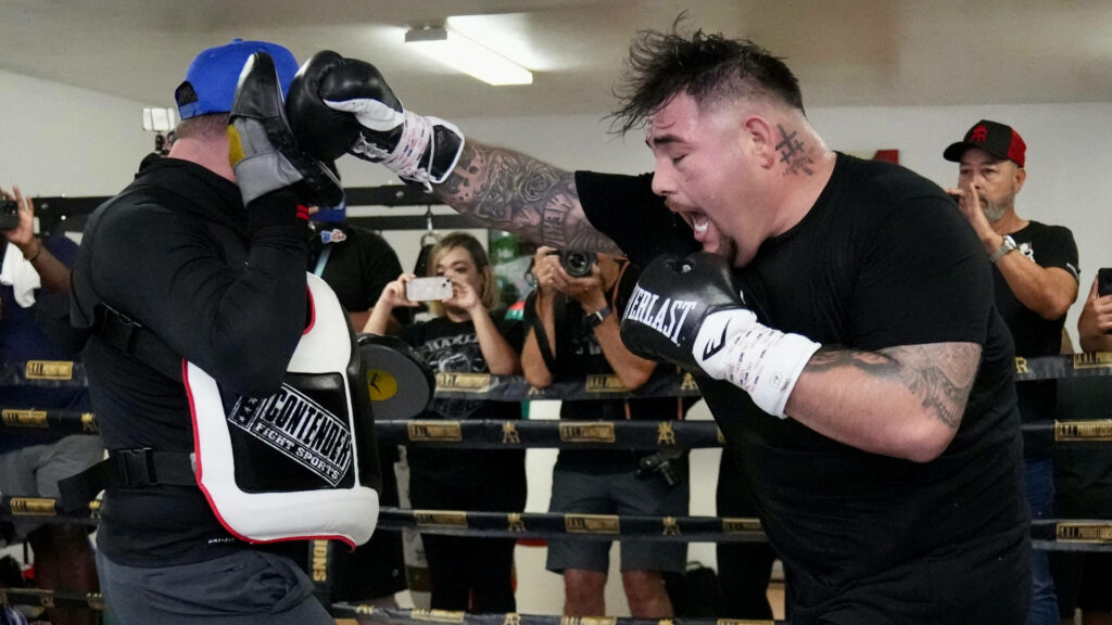 Andy Ruiz Jr. powerfully trains in boxing gym showcasing determination during media day session wallpaper