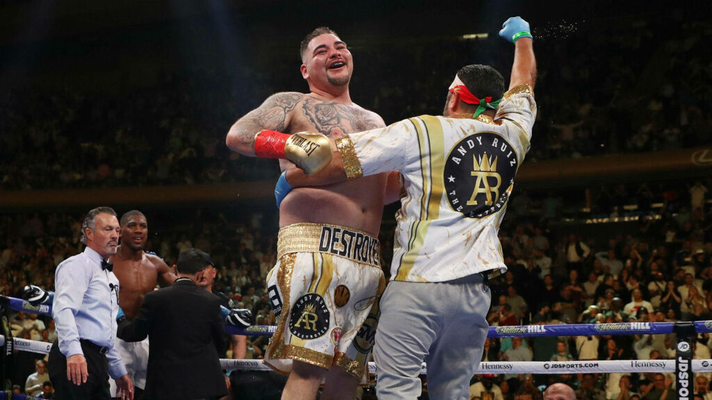 Andy Ruiz Jr celebrates boxing victory lifted by team with intense energy and excitement wallpaper