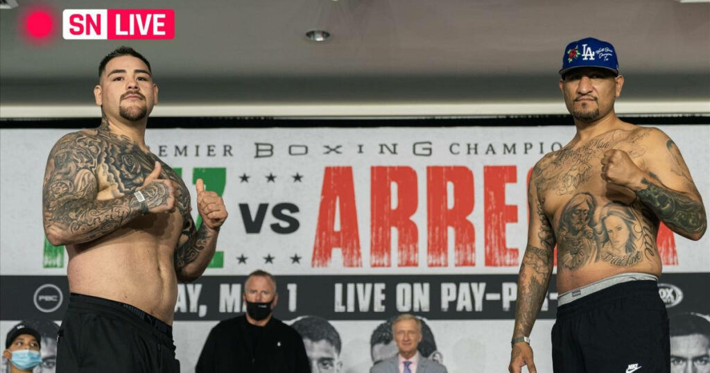 Andy Ruiz Jr and Chris Arreola face off confidently at boxing match weigh-in promotional backdrop Wallpaper