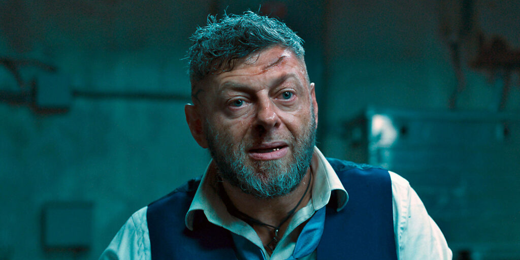 Andy Serkis as Klaw with intense expression rugged look dark atmospheric wallpaper background