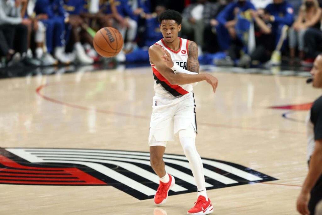 Anfernee Simons Portland Trail Blazers dynamic basketball pass intense game action wallpaper