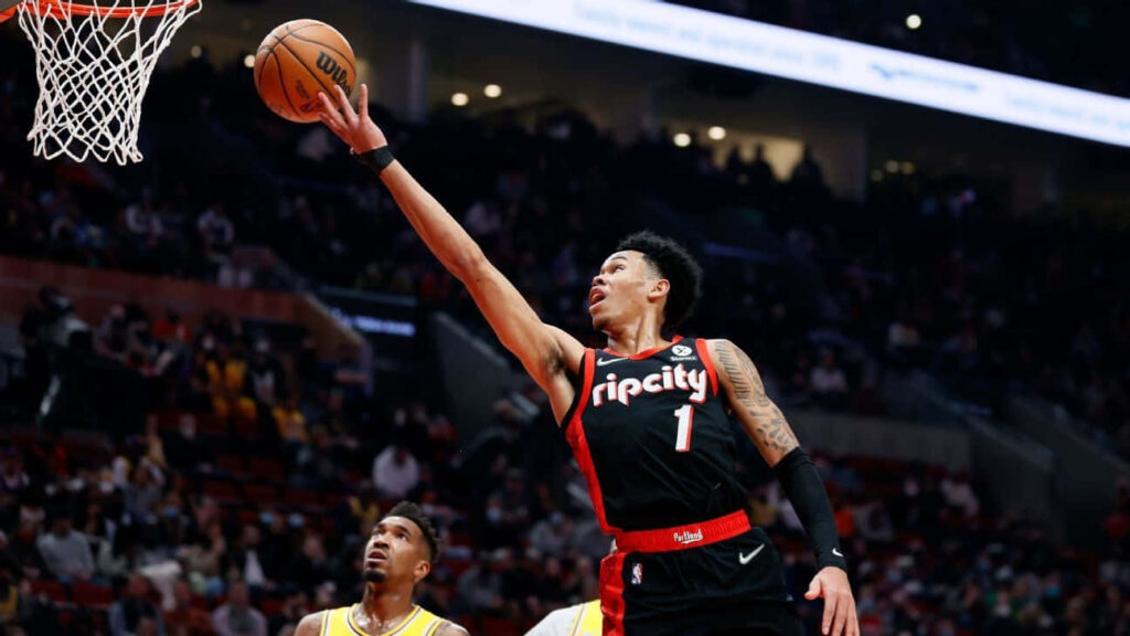 Anfernee Simons Portland Trail Blazers soaring layup basketball game high-flying action wallpaper