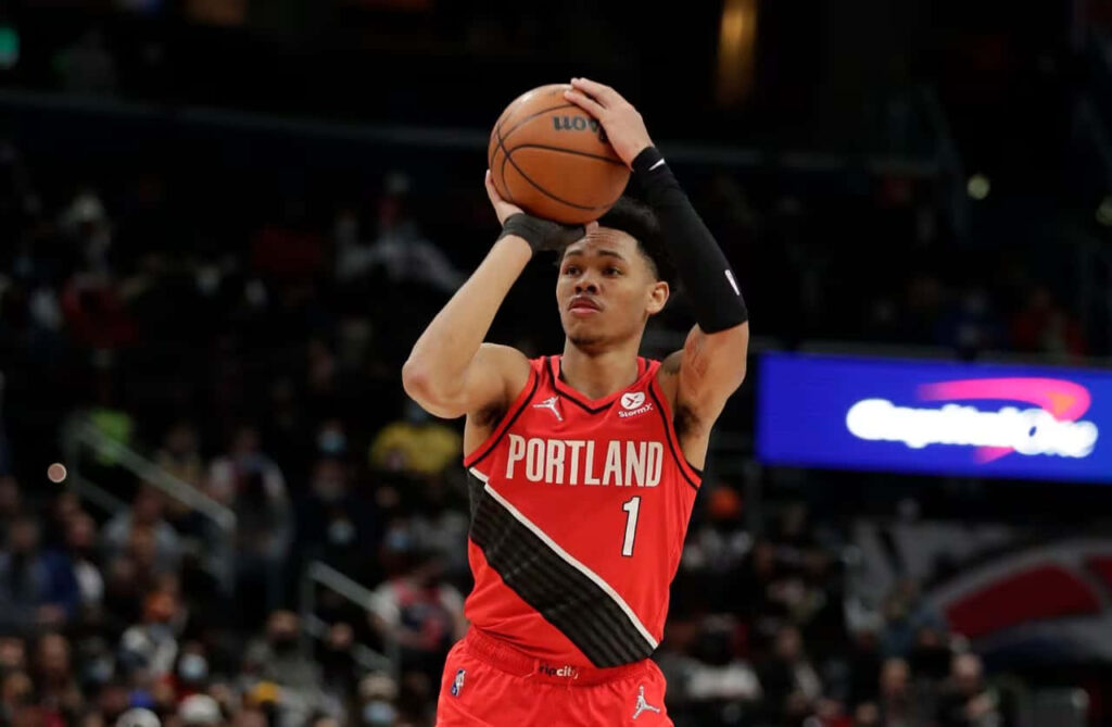 Anfernee Simons Portland basketball player shooting mid air showing skill and focus wallpaper