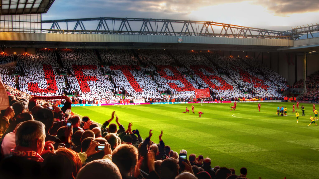 Liverpool Anfield Stadium vibrant crowd display showing passionate fan unity during match wallpaper
